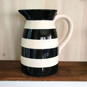 Black and white ceramic pitcher bid vase